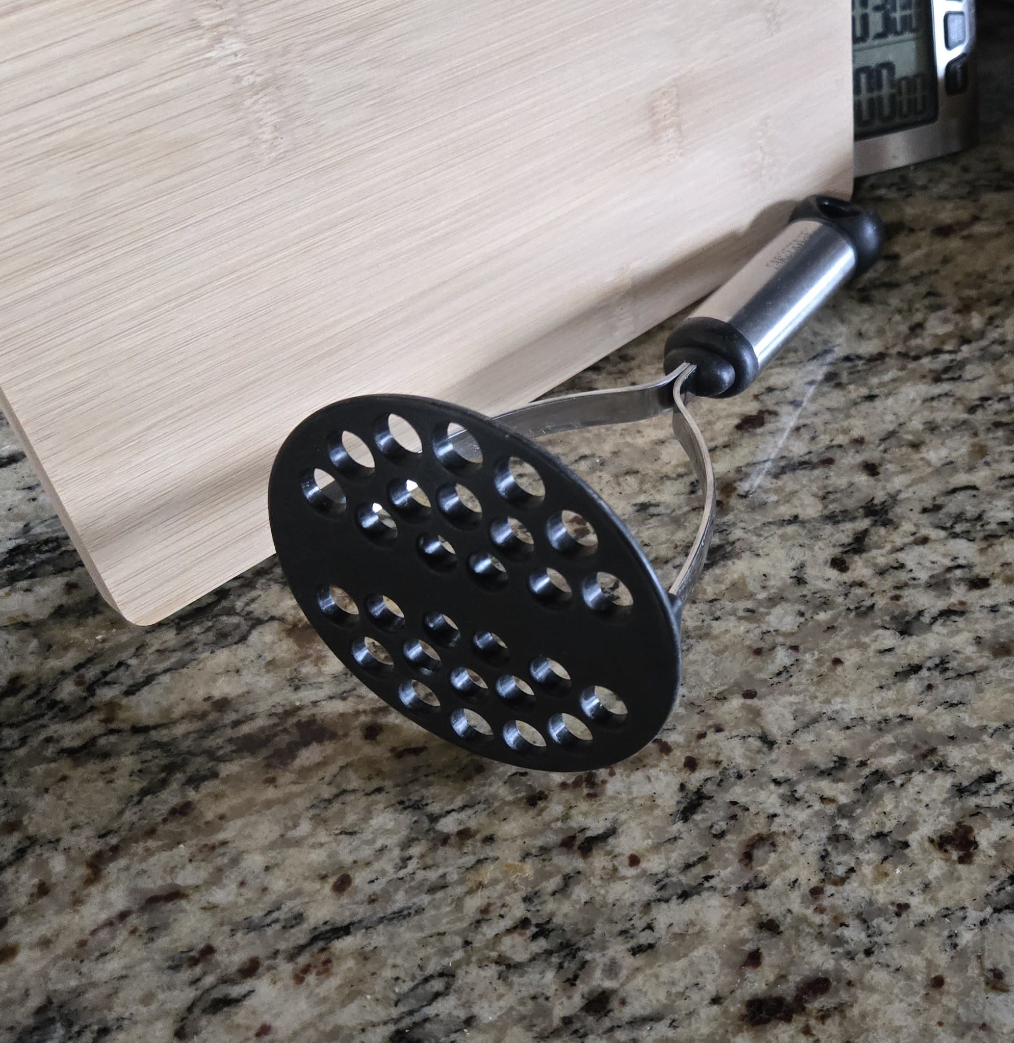 My Farberware potato masher with a round perforated head