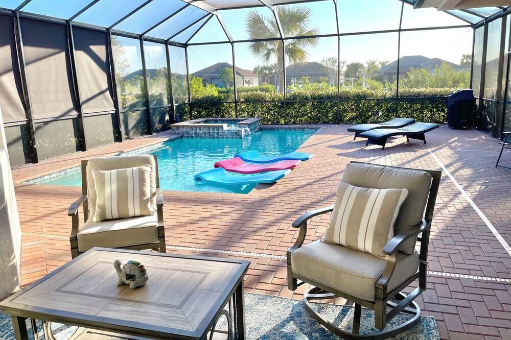 Waterfront, gated community, heated pool spa, boat lift, Gulf access, home gym