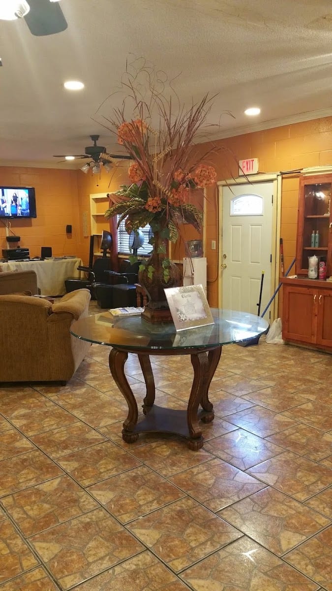 Charita's Touch Salon Of Care LLC , Extra Point Cuts Barbershop