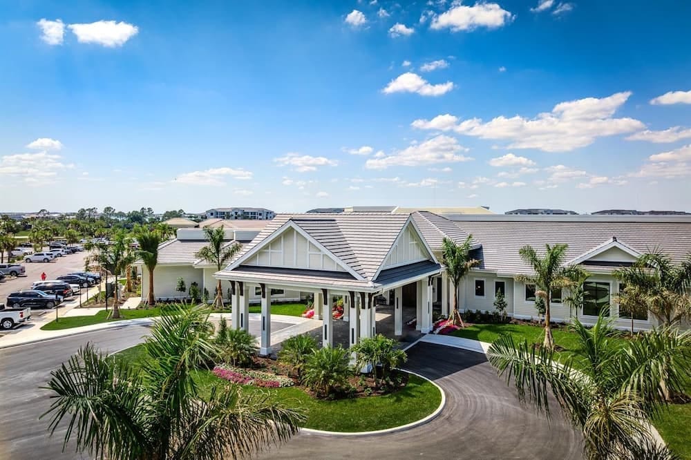 2BR golf condo in Babcock Ranch with pool, gym, WiFi, and lake views.