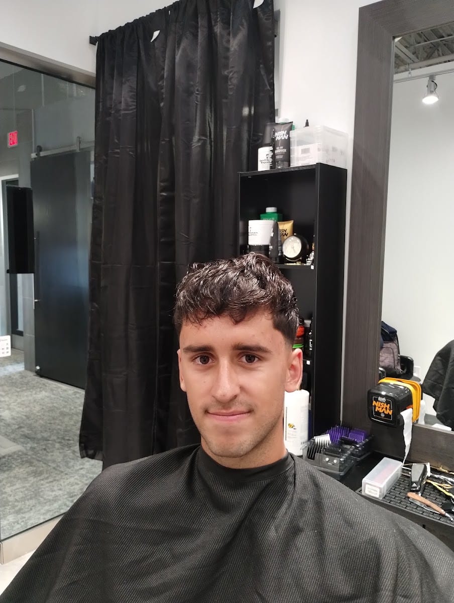 KOZMIC BARBERSHOP LLC