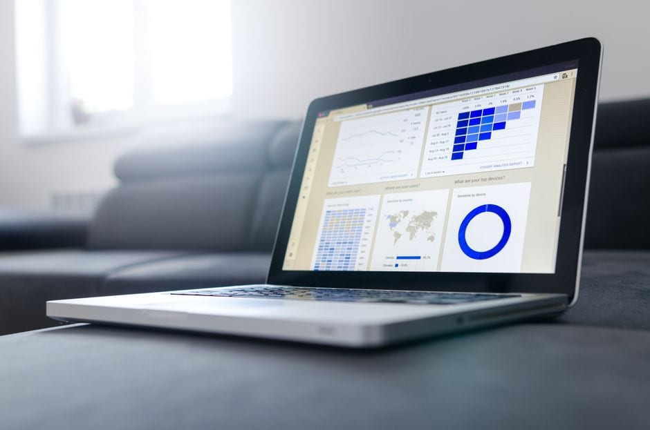 Illustrative stock photo of a laptop displaying business charts