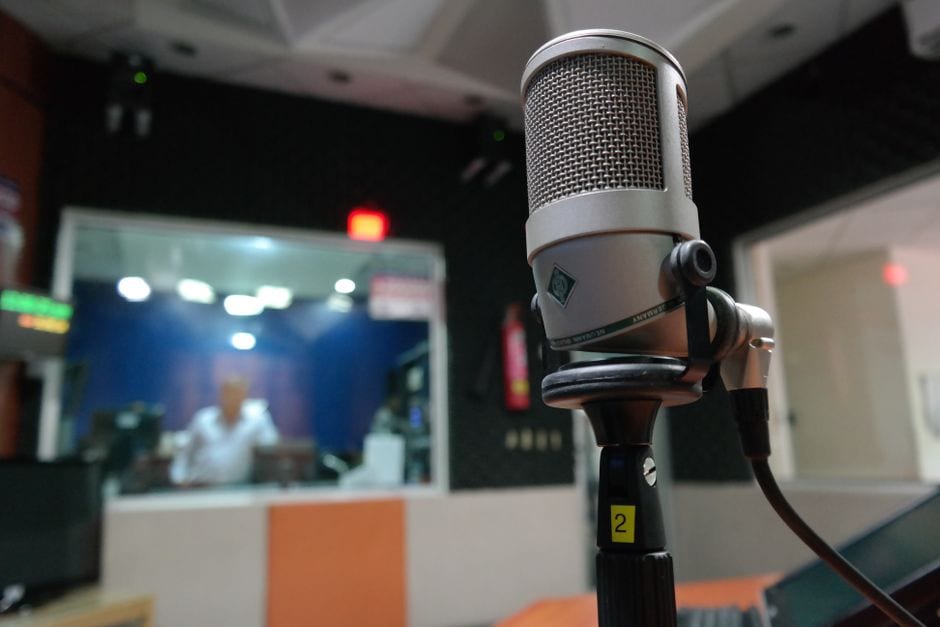Illustrative stock photo of a microphone in a recording studio
