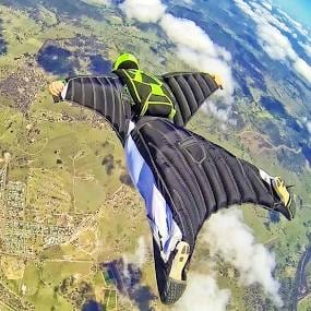 Meet the Oldest Wingsuit Daredevil Defying Gravity Over Grand Traverse Skies