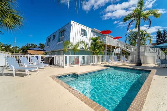 Walk to the 1 Beach in America, Offers Heated community Pool, Free Wi-Fi