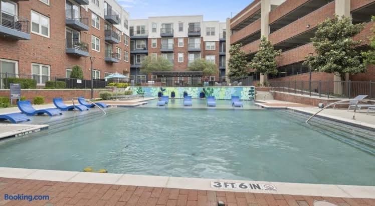 Luxe 1BR Stay with Pool, Gym & EV Charger