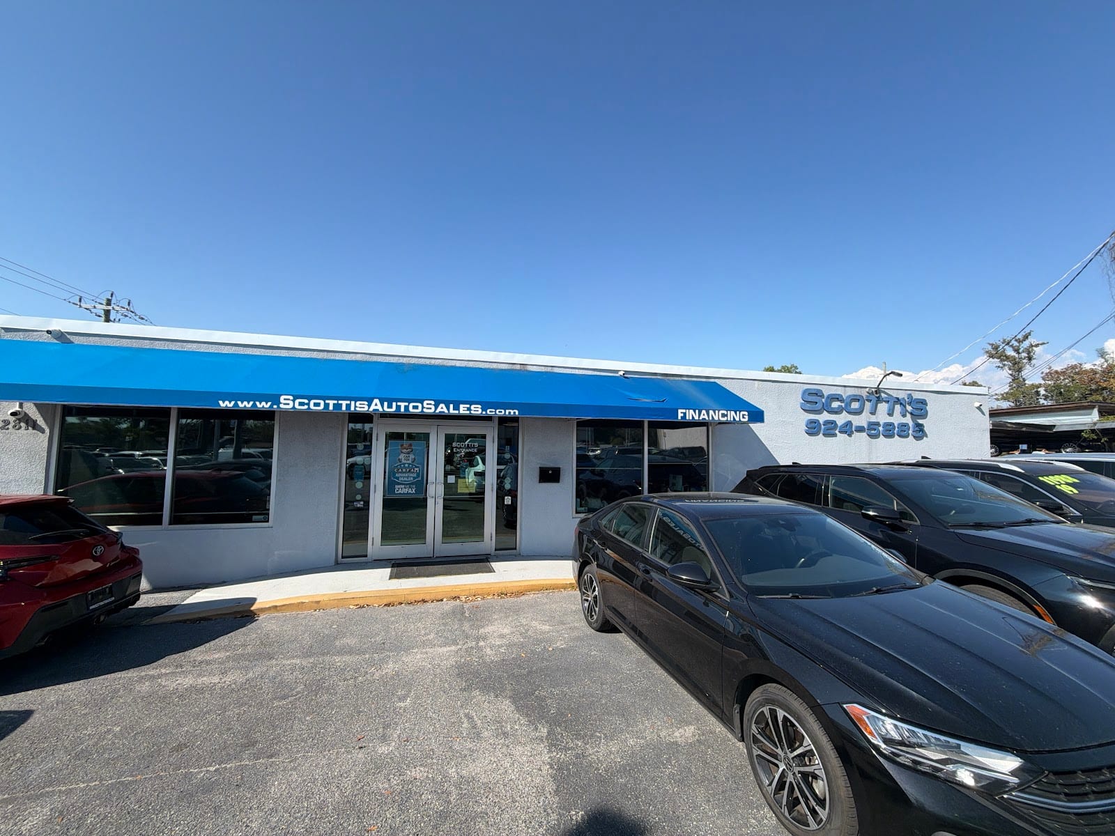 SCOTTI'S AUTO SALES SARASOTA~ PRE-OWNED~USED CARS, photo 2