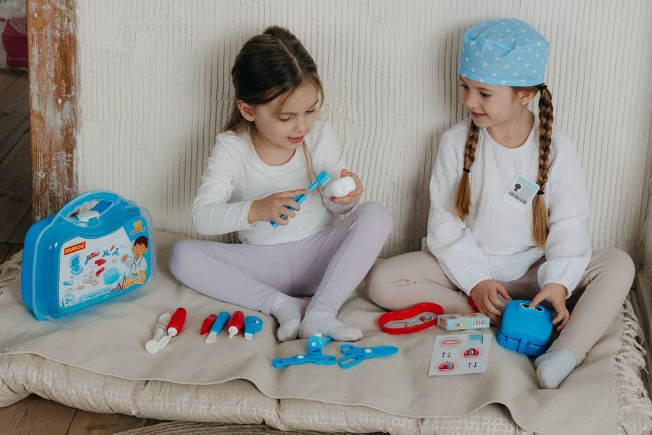 Illustrative pretend-play toys and activities; not INK exhibits