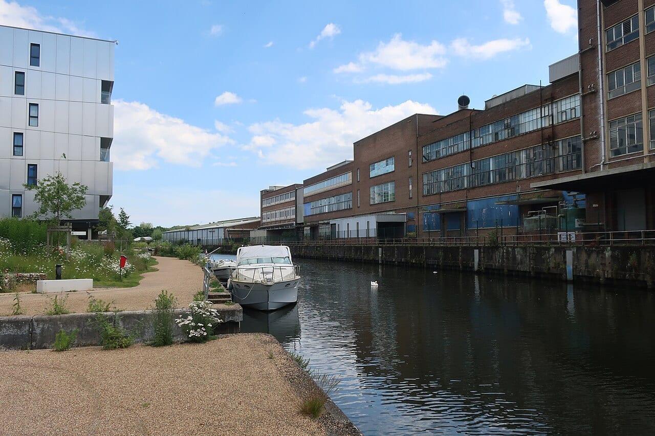 Archive view of the former Carrow Works industrial buildings beside the River Wensum