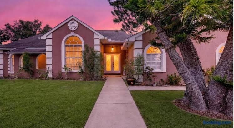 4 bedrooms sleep 8 private heated pool on golf course 4 mil to the beach