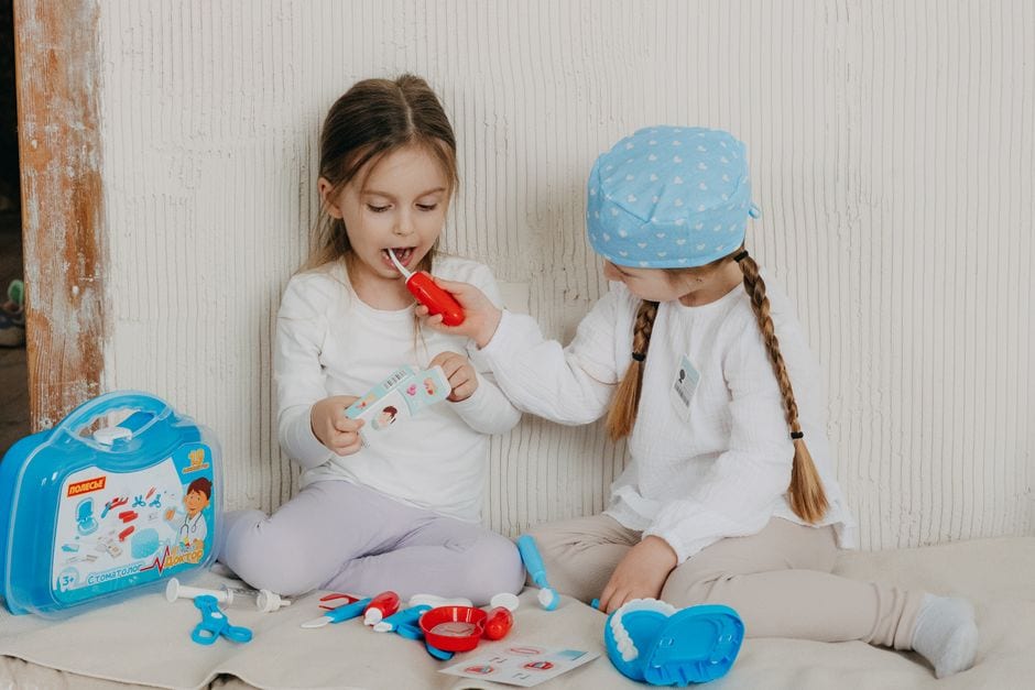 Illustrative pretend-play toys and activities; not INK exhibits