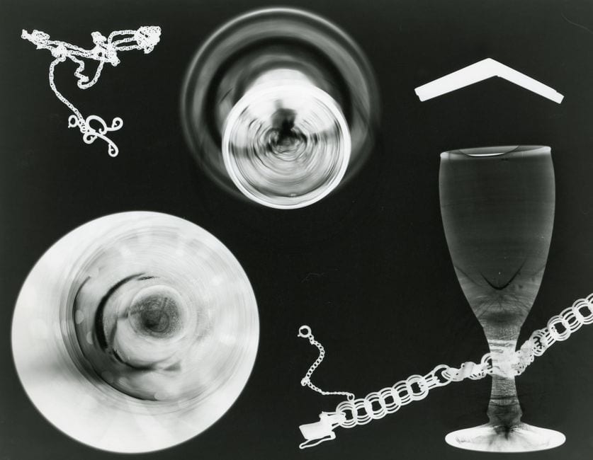 Illustrative x-ray artwork of glass objects and chains; not exhibition artwork