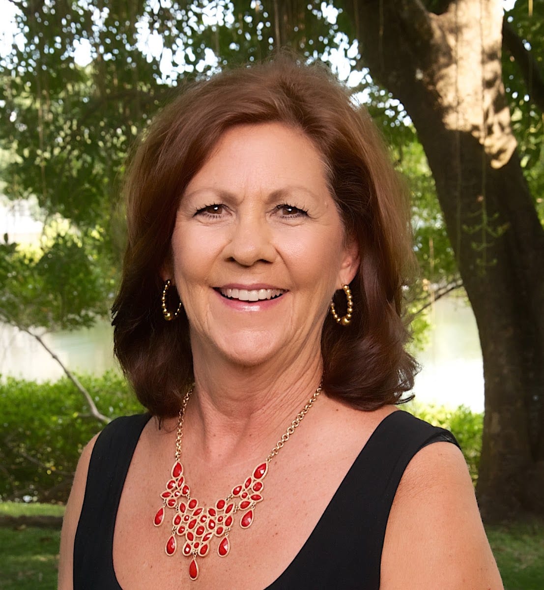 The Kathi "O" Group - RE/MAX Palm Realty