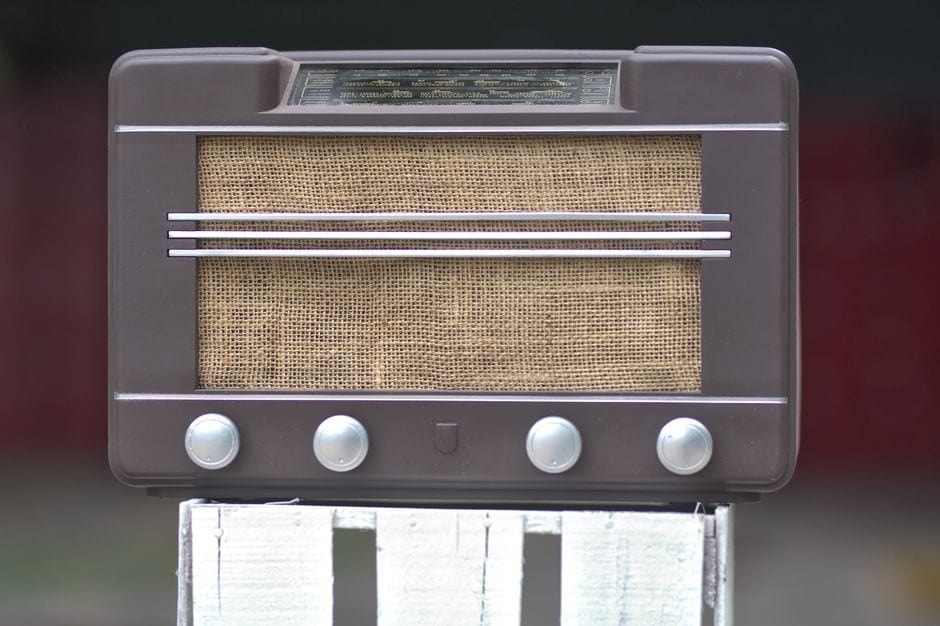 Illustrative stock photo of a vintage brown tabletop radio