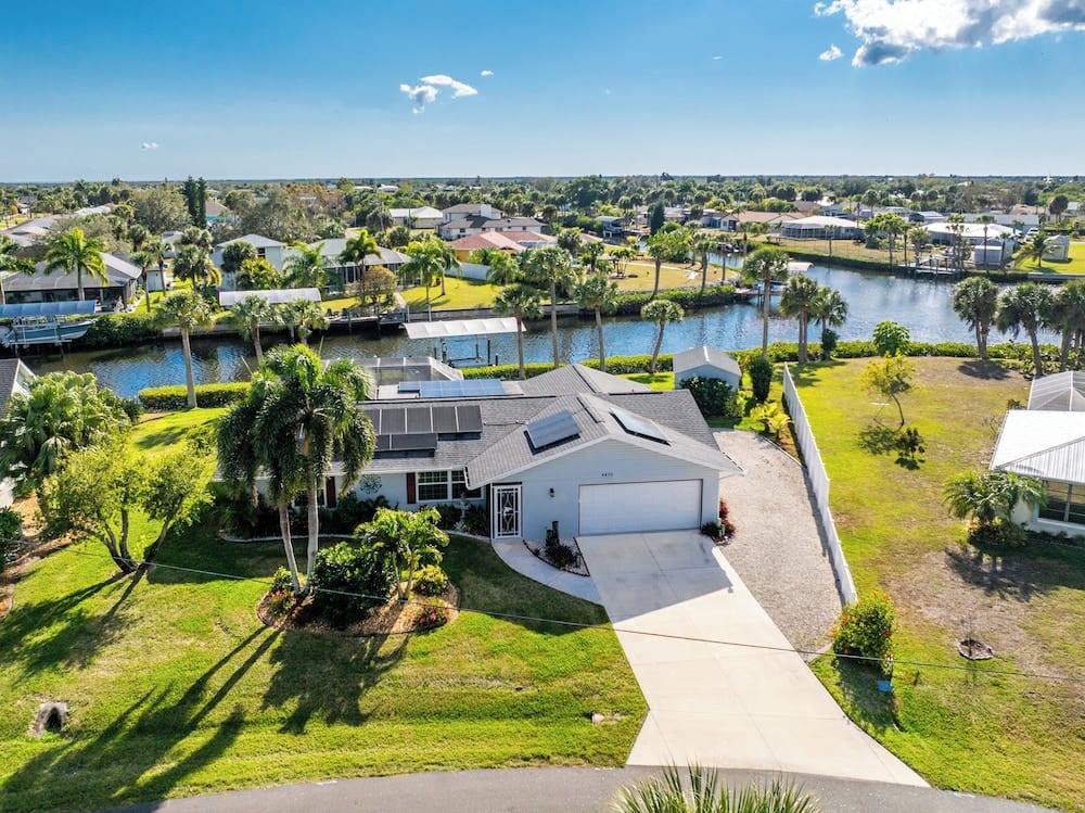 Canal-Front 3BR w/ Heated Saltwater Pool, Dock, BBQ & Ping-Pong — Near Beaches!