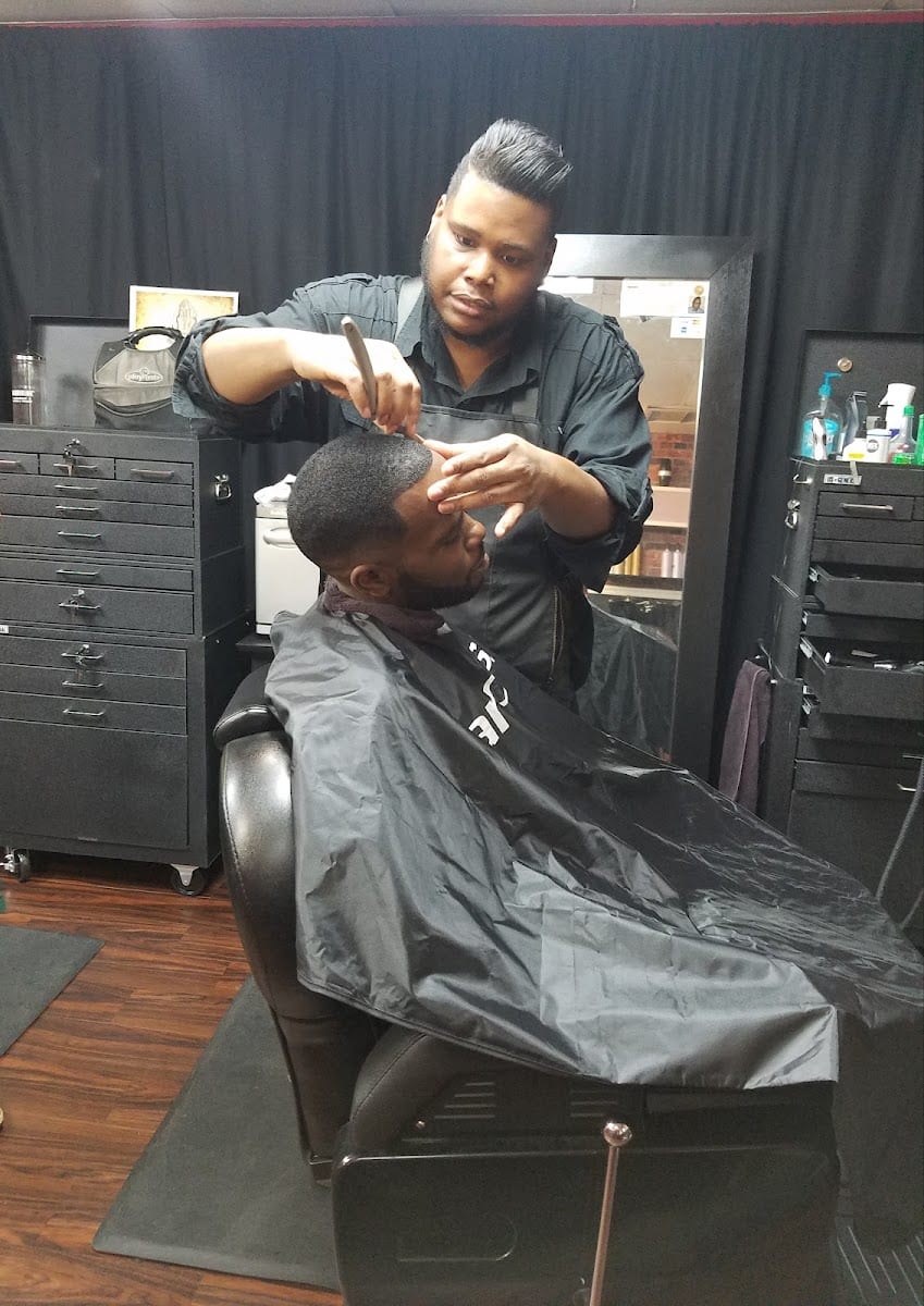 Kut It Out Hair Lounge LLC.
