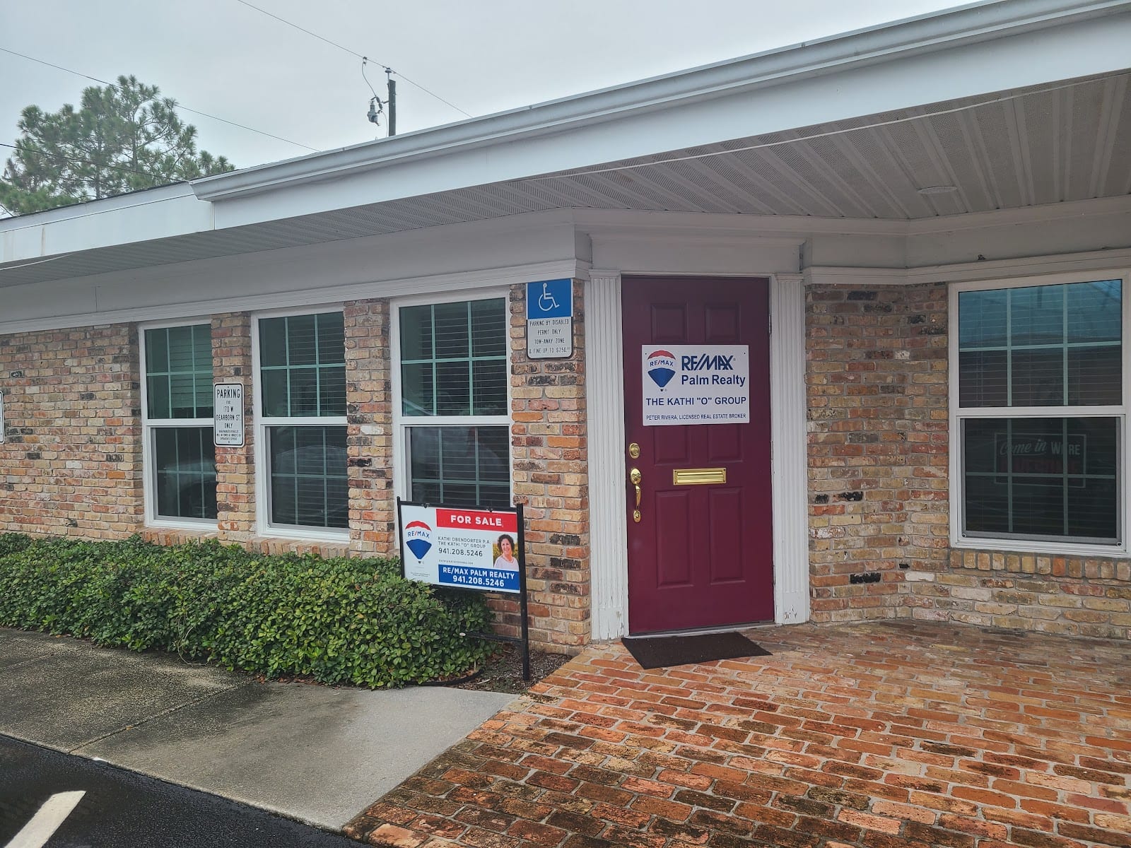 The Kathi "O" Group - RE/MAX Palm Realty