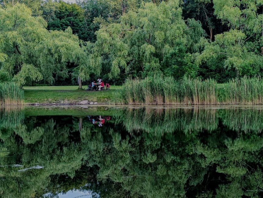 Illustrative lakeside setting; not Lake Lanier Olympic Park
