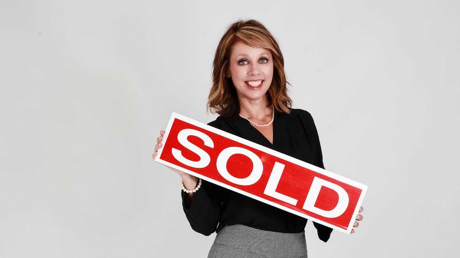 Teresa Rexing, The T-Rex & Associates Group, RE/MAX Unlimited, photo 3